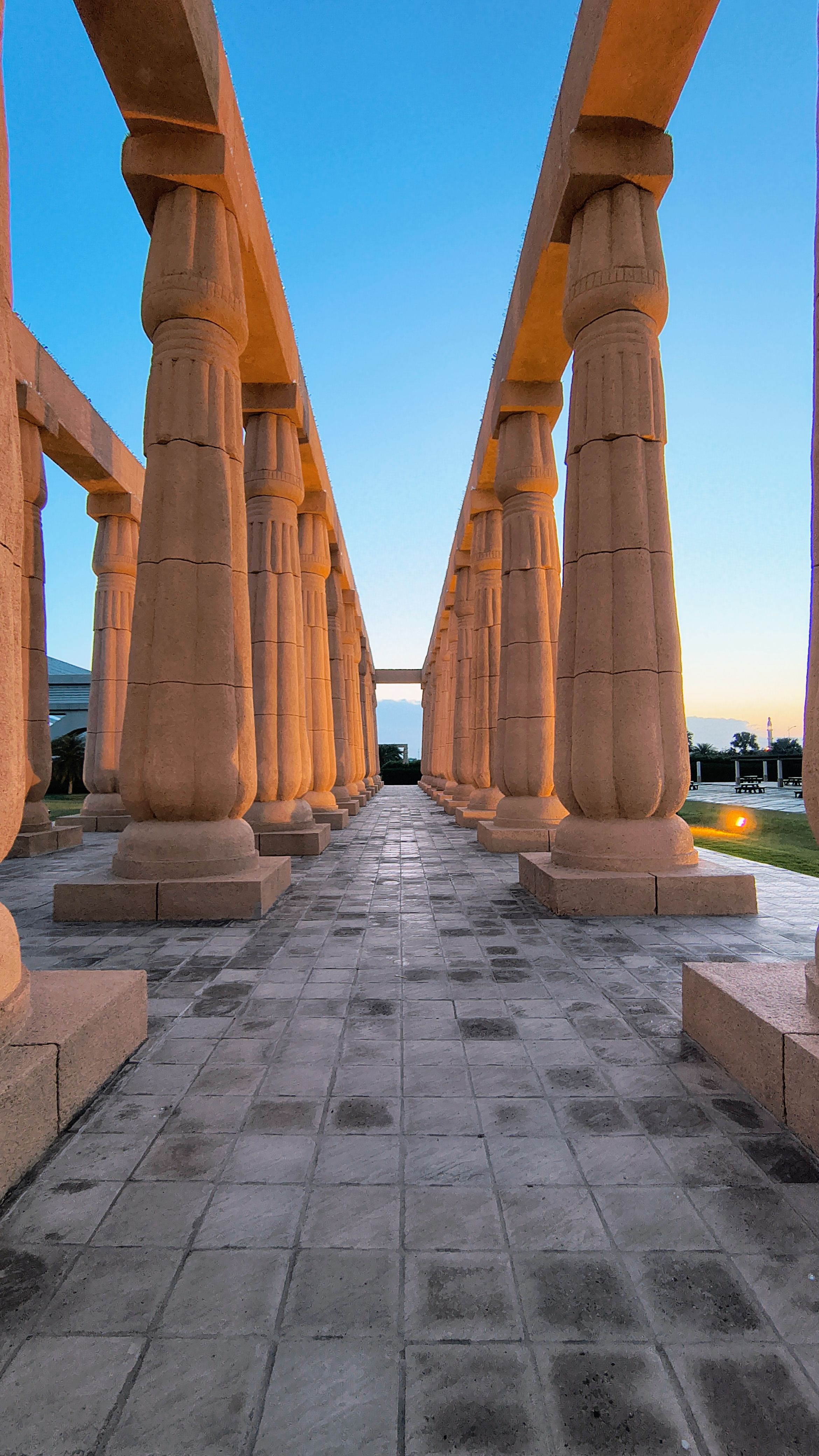 Ancient Columns Under Clear Blue Sky · Free Stock Photo