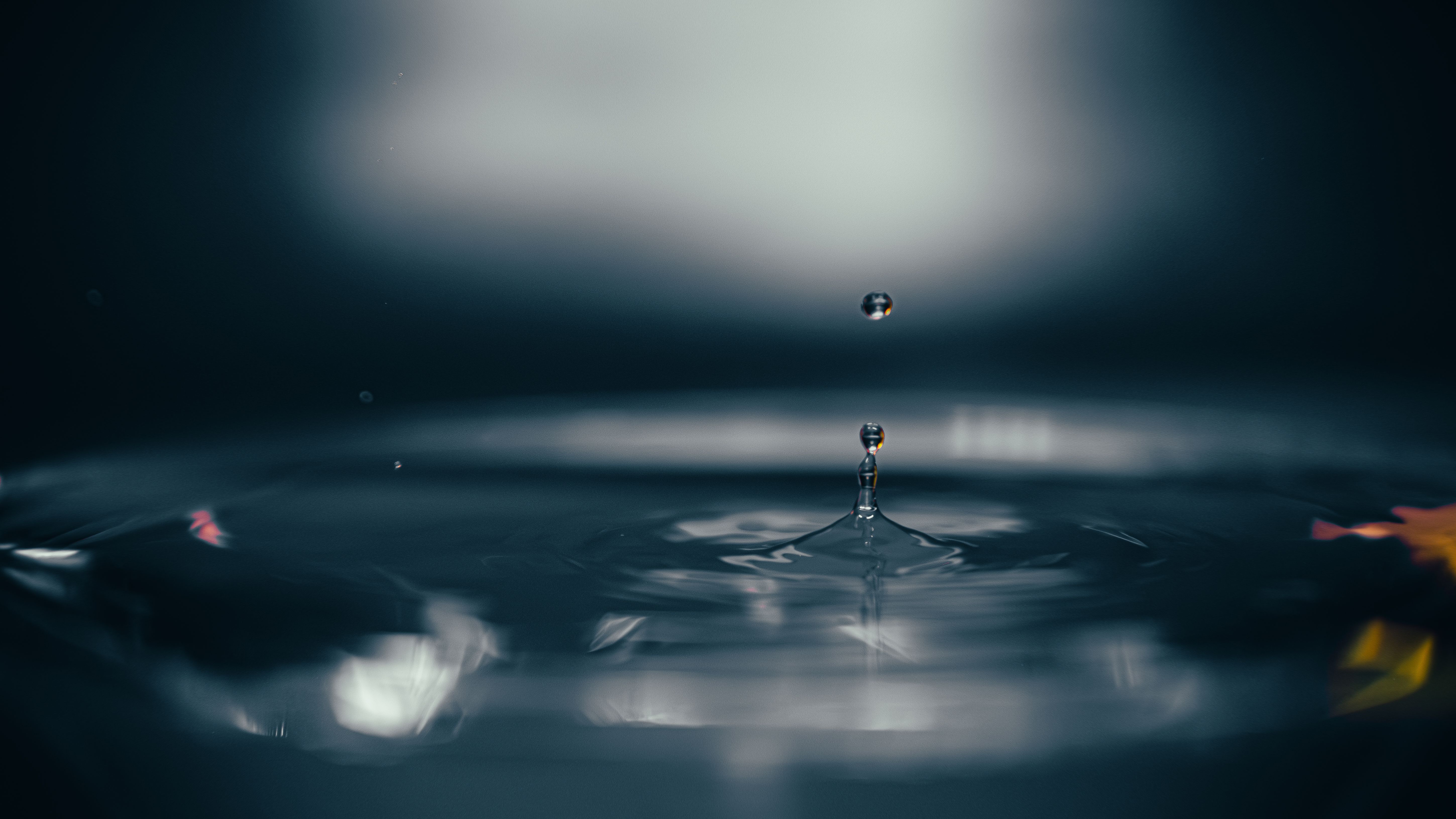 Captivating Macro Shot of a Water Droplet in Motion · Free Stock Photo