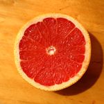 Halved red-fleshed citrus fruit, photo by Mustafa Akın on Pexels