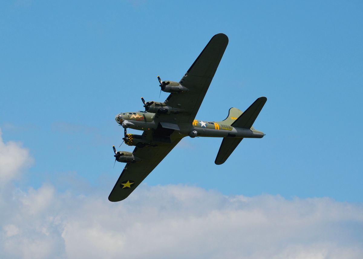 Vintage B-17 bomber in flight — Robert Rosenthal pilot and the 100th Bomb Group