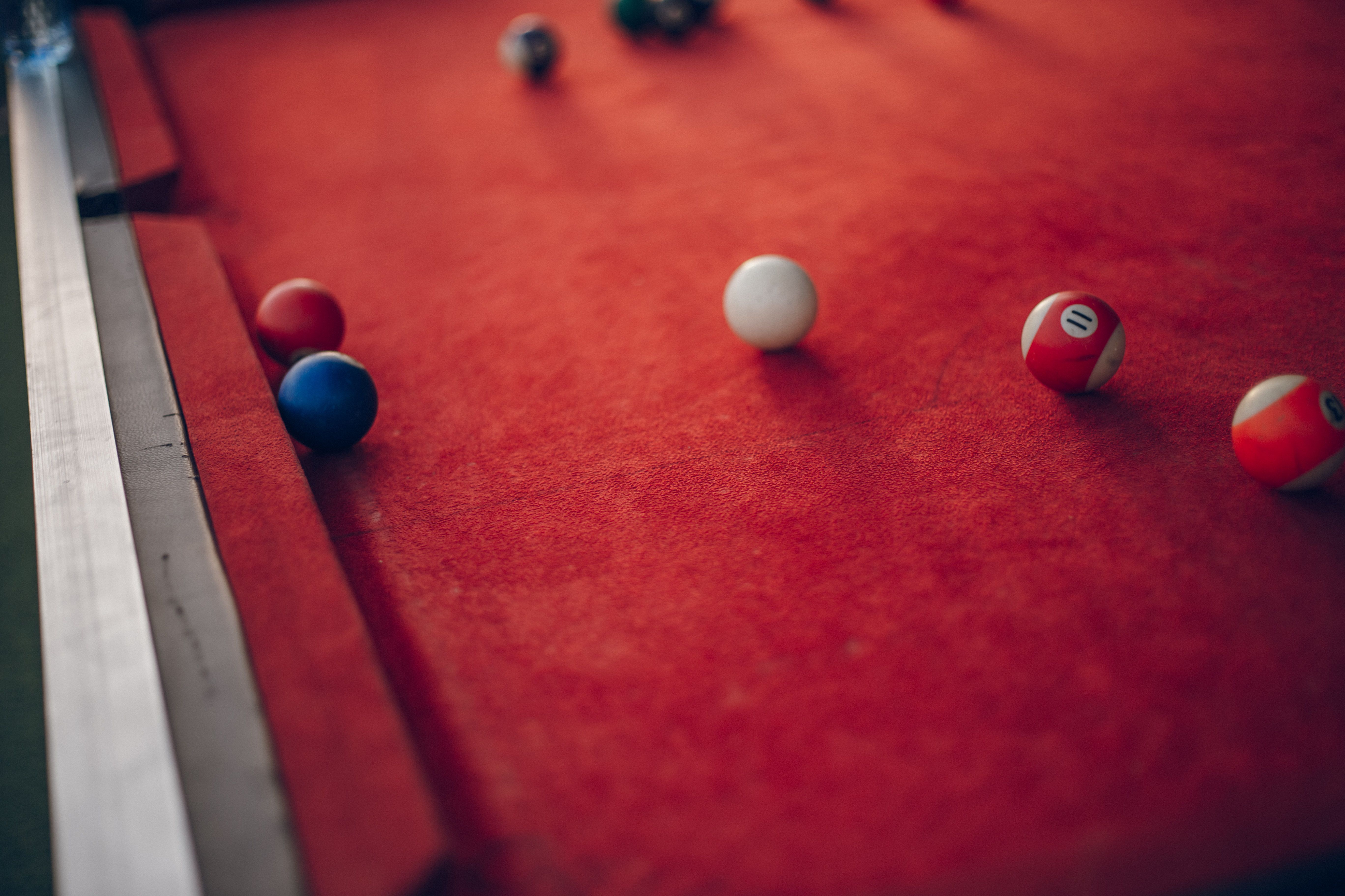 Vibrant Red Pool Table with Billiard Balls · Free Stock Photo