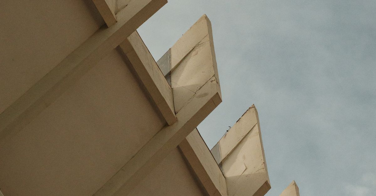 Angled Structure Modern Architectural Structure with Angled Design · Free Stock Photo