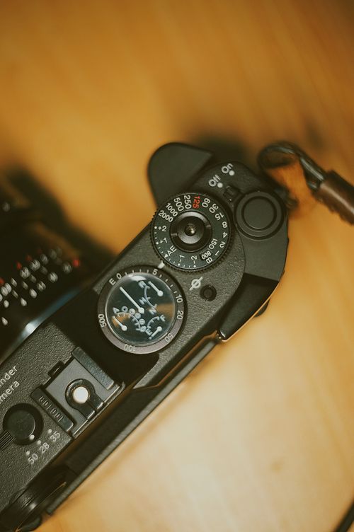 Free Close-up of a vintage camera's dials showcasing intricate detailing and functionality. Stock Photo