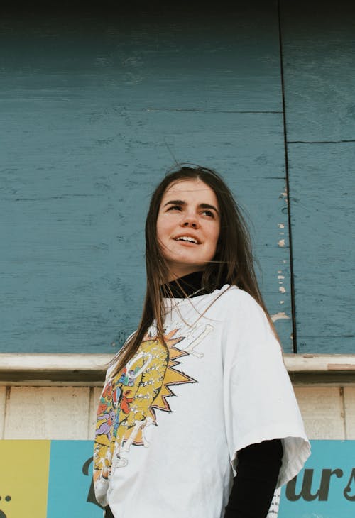 Woman in White and Yellow Shirt