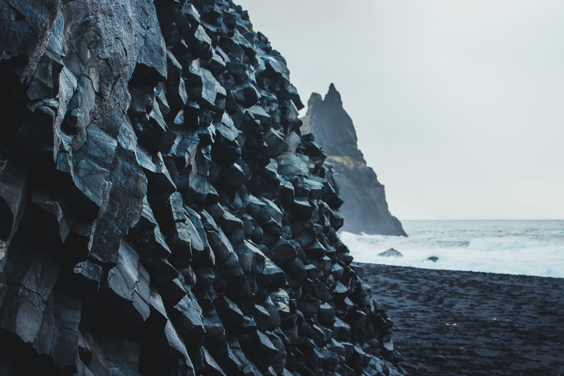 reynisfjara iceland black sand beach basalt columns sea stacks dramatic waves