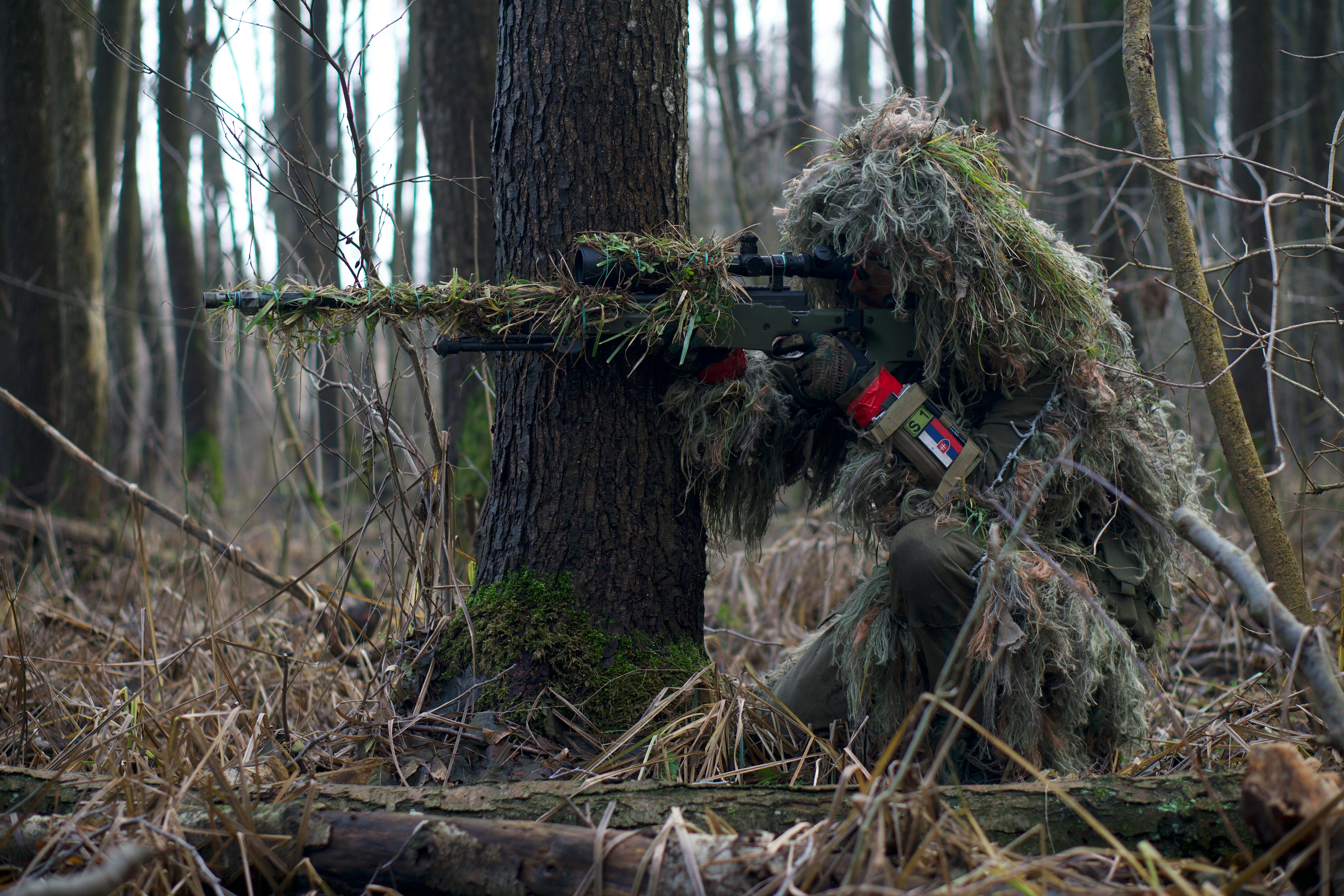 Sniper in Camouflaged Suit with Rifle Stock Image - Image of