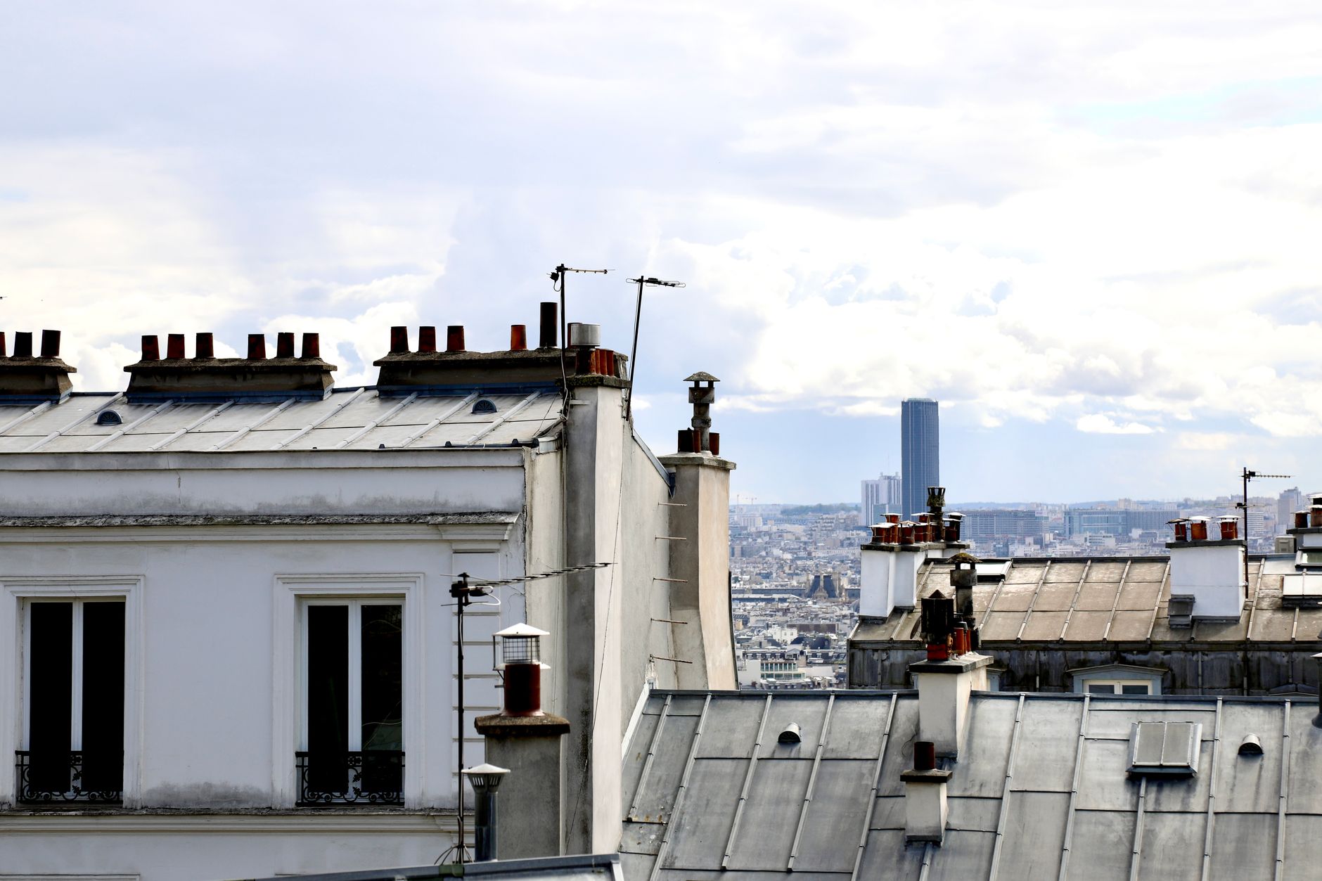 Top of a brick chimney showing crown and cap — chimney crown vs cap comparison