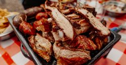 Delicious grilled meats on a platter at an Argentinian asado. Perfectly roasted in Buenos Aires.