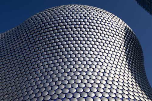 Free Close-up of the futuristic design and curved facade of the Selfridges Building, Birmingham, England. Stock Photo