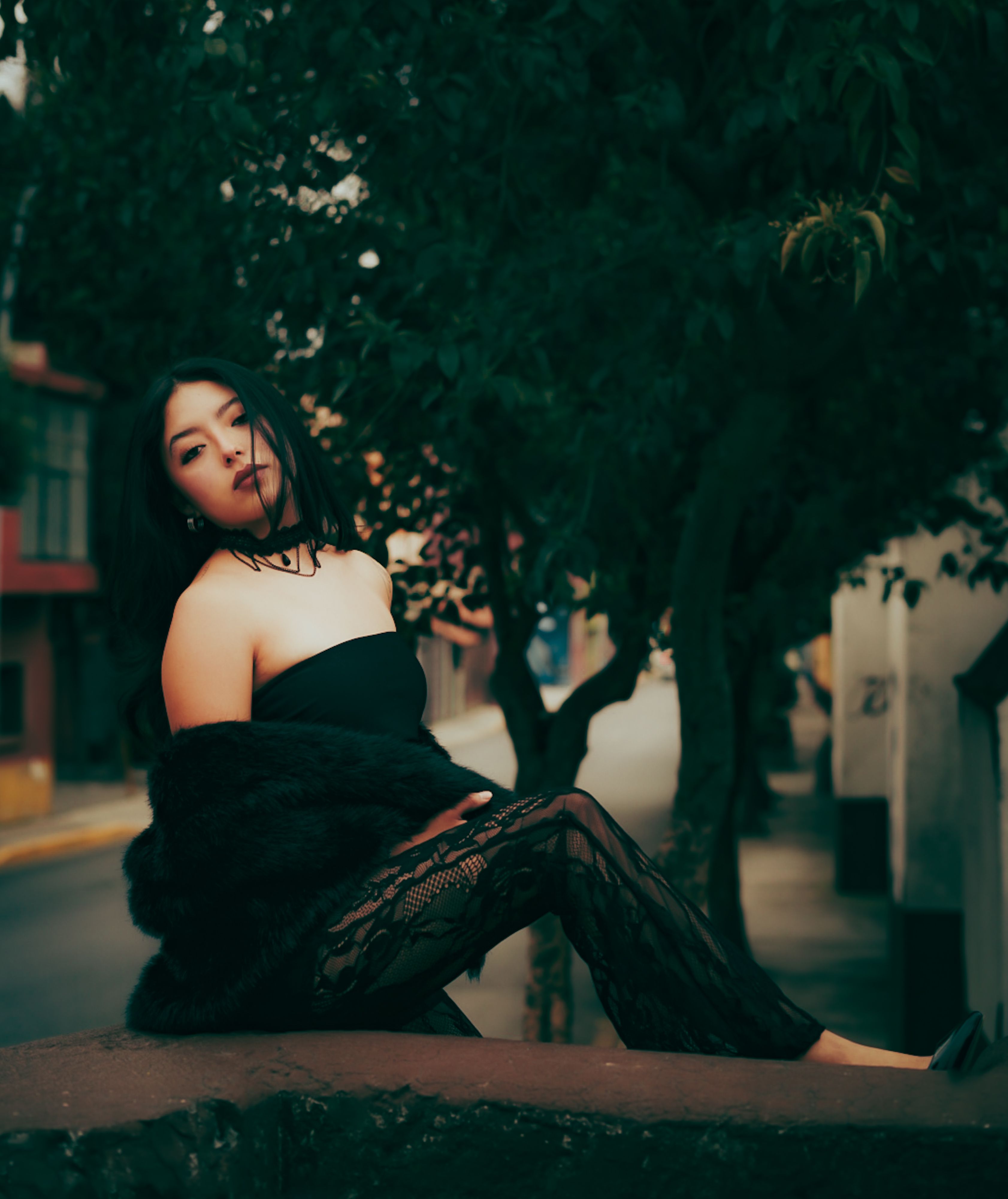 Stylish Woman Posing Outdoors in Urban Setting · Free Stock Photo