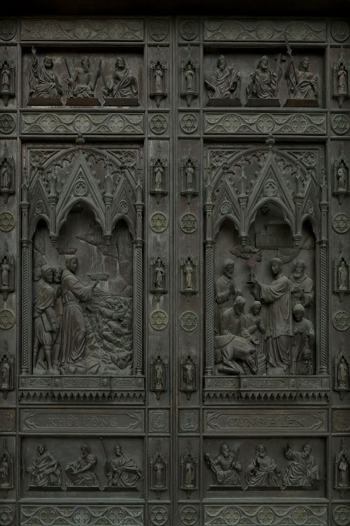 Free Detailed carvings on a Gothic-style cathedral door in Ho Chi Minh City, Vietnam. Stock Photo