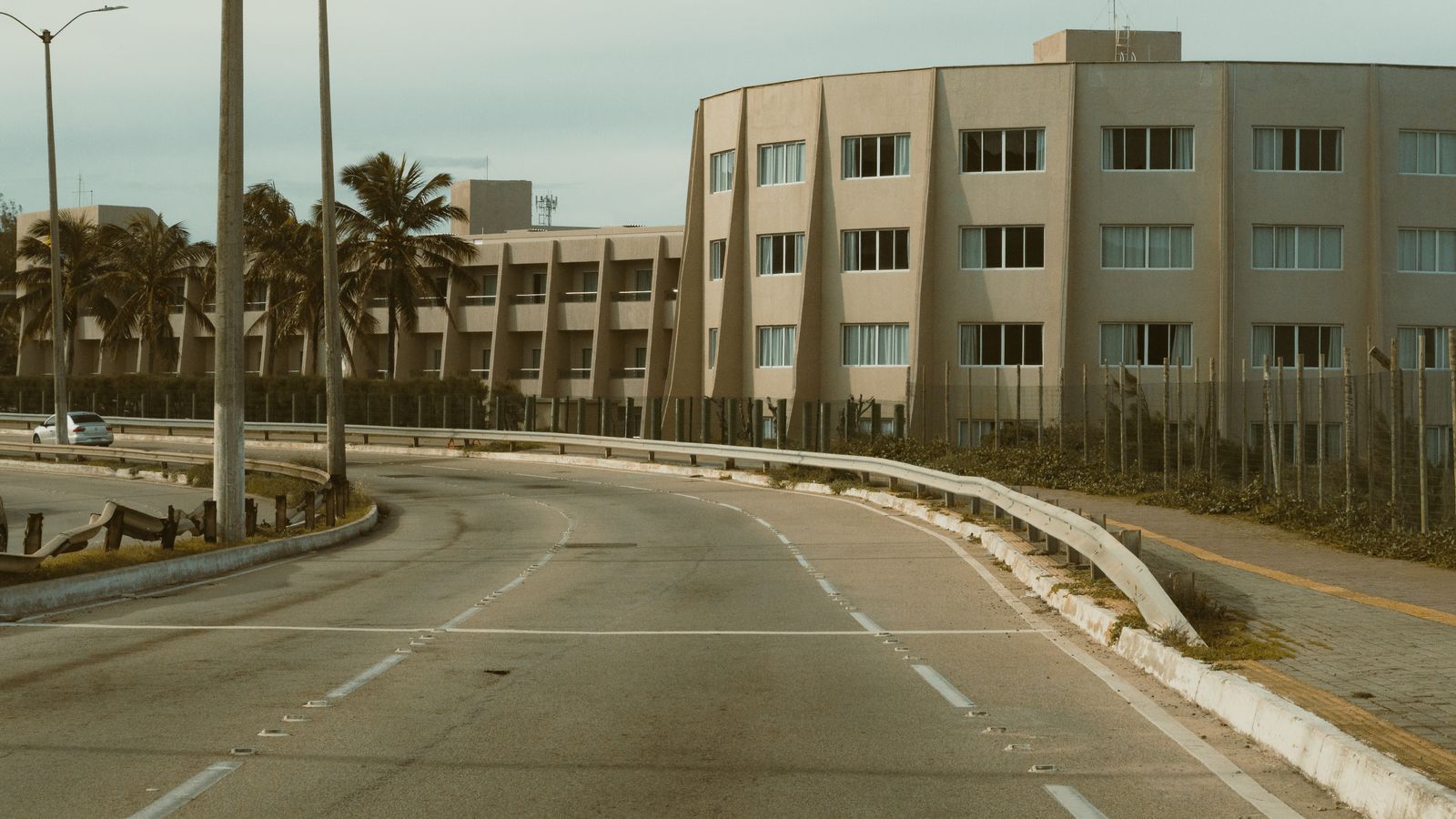 Urban road curve with modern building in natal, Equatorial Guinea