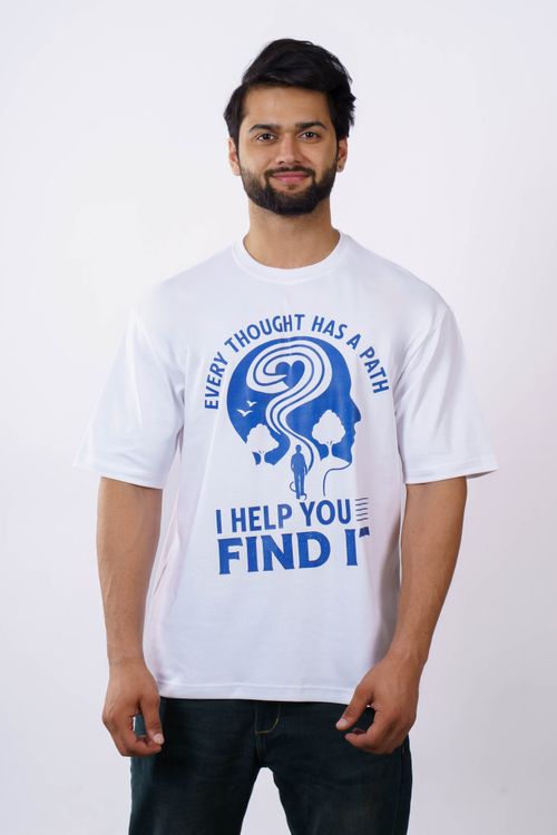 Free A man wearing a white t-shirt with a motivational print, standing against a plain background. Stock Photo