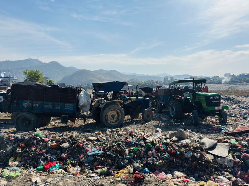 Trucks hauling large commercial loads of junk and debris