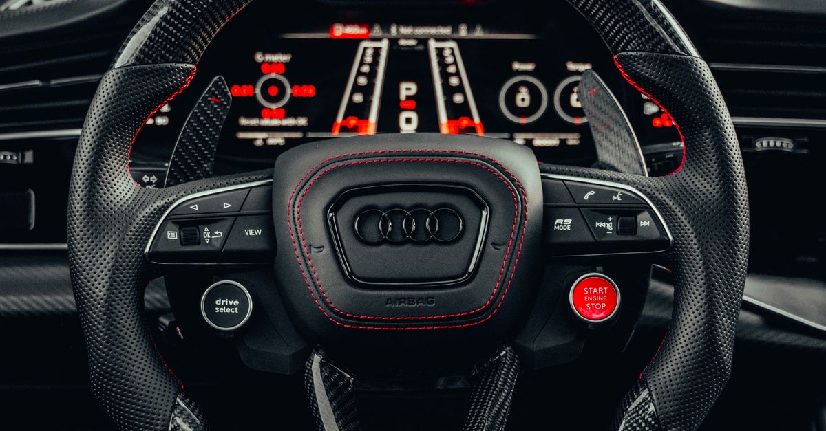 Luxury Car Steering Wheel with Digital Display · Free Stock Photo