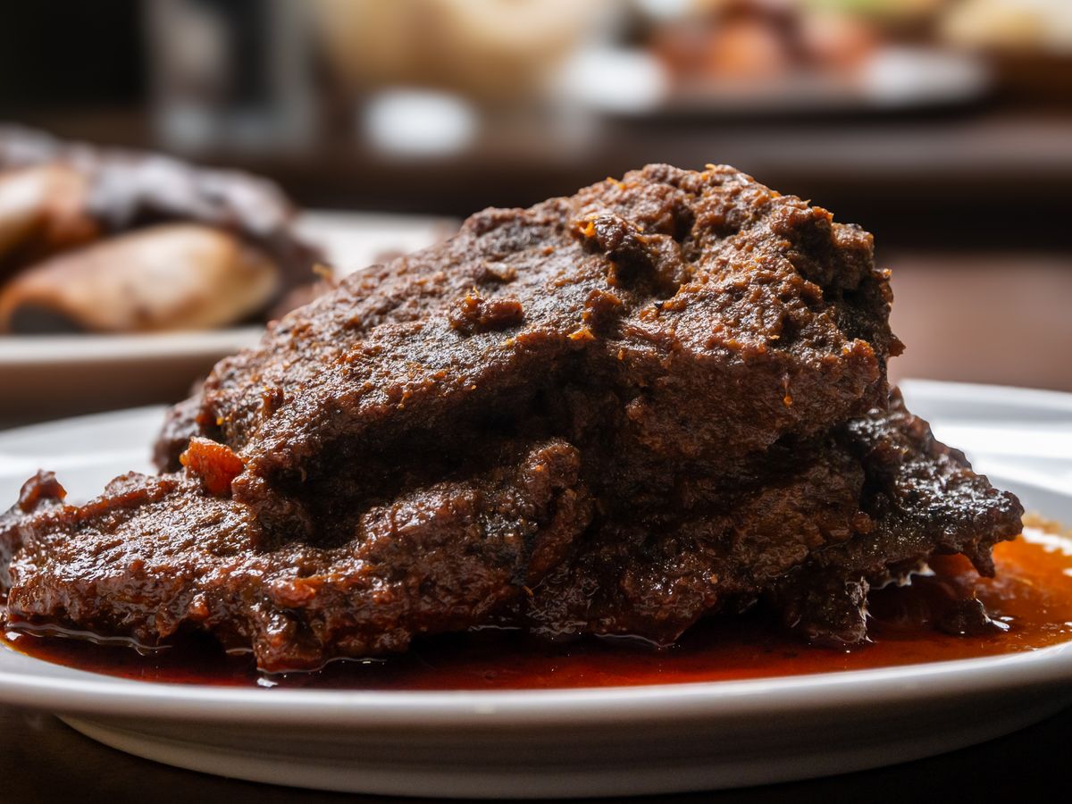 Rich and spicy beef rendang — the traditional Indonesian slow-cooked curry with clinging coconut sauce