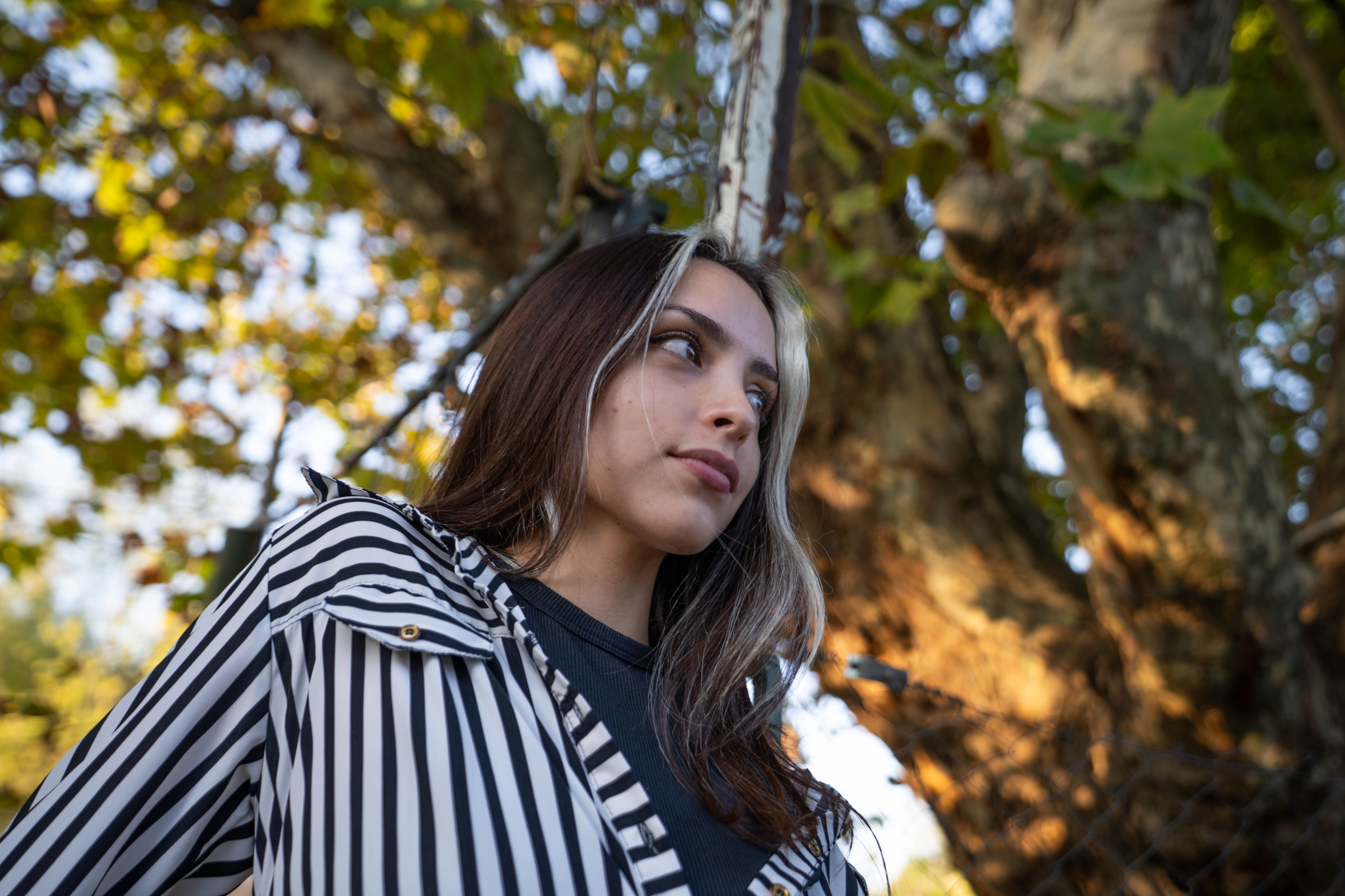 Stylish Portrait of a Young Woman outdoors · Free Stock Photo