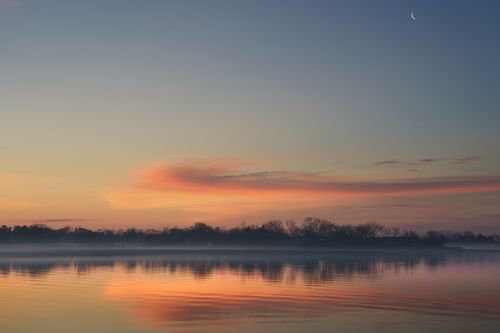 Free Tranquil dawn at Cove Island Park with a pink sky reflecting on calm waters in Stamford, Connecticut. Stock Photo