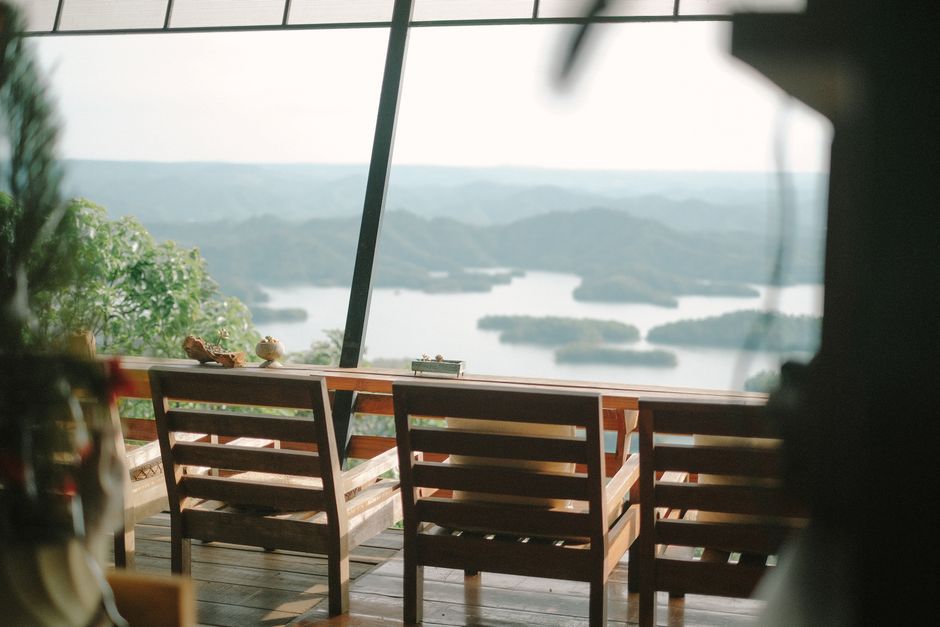 Peaceful indoor restaurant with breathtaking lake view.