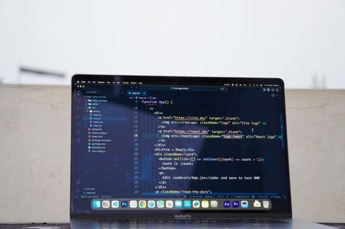 Web Development — Laptop displaying code during software development work