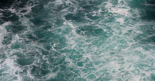 Free Captivating ocean waves crashing near Cantabria, Spain, showcasing their vibrant turquoise color. Stock Photo