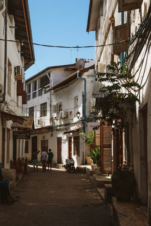 Free Discover the narrow streets and charming architecture of Zanzibar's Stone Town. Stock Photo