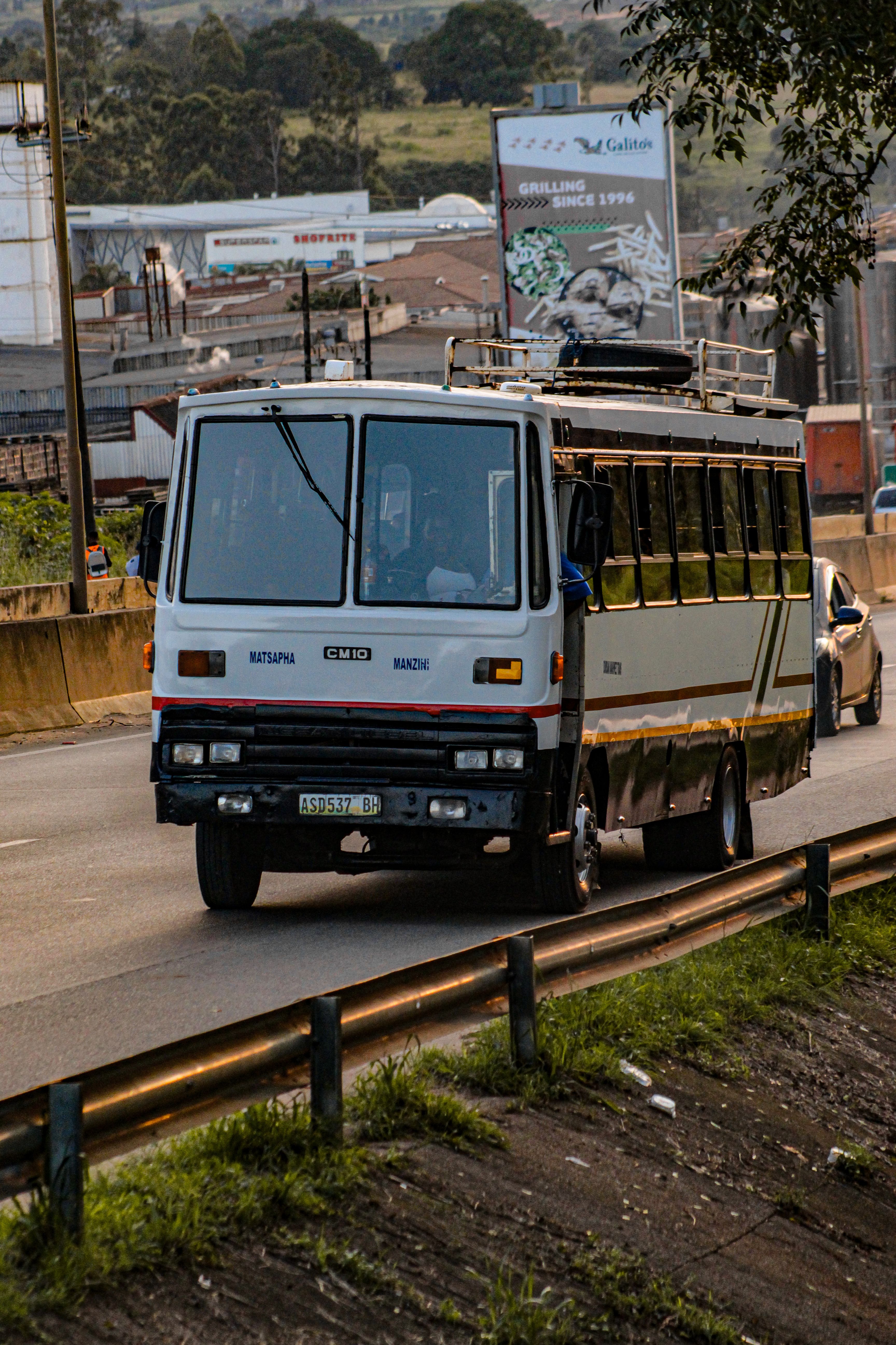 Matsapha Commuter Bus on Road · Free Stock Photo