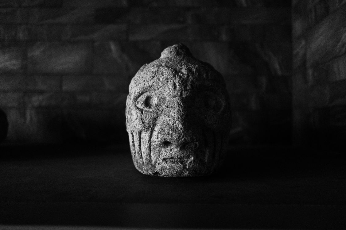 Ancient Stone Sculpture in Black and White · Free Stock Photo