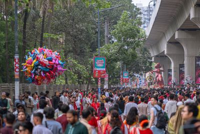 Festival crowd under balloons (photo: Julian Fernandez on Pexels)