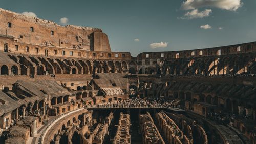 Free Explore the ancient Colosseum in Rome, Italy with its captivating historic architecture. Stock Photo