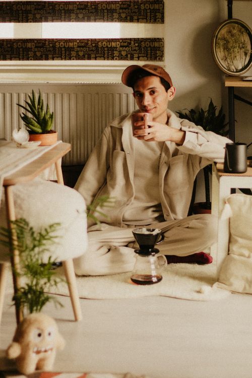 Cozy Man Cozy Living Room with Young Man Relaxing · Free Stock Photo