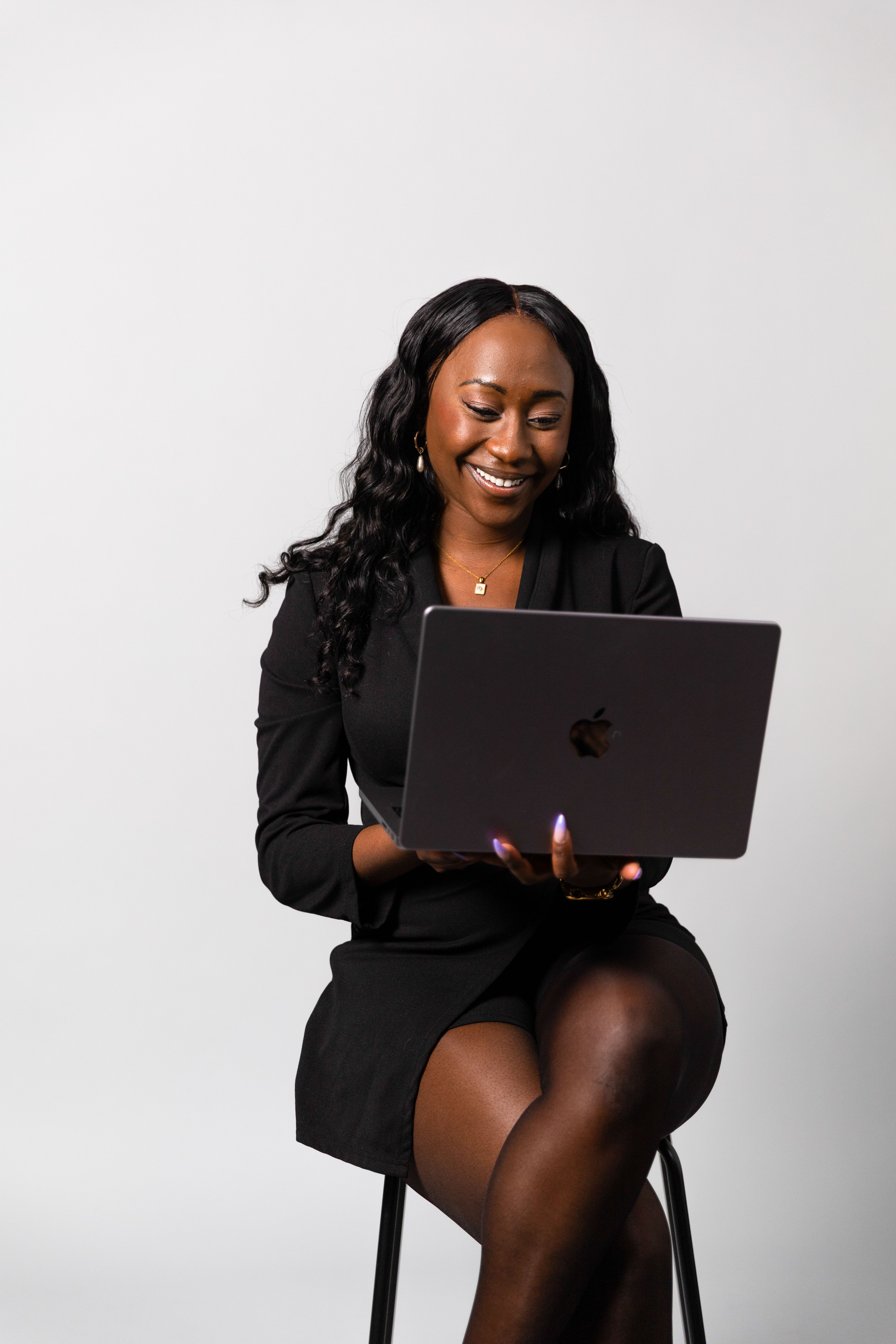 Founder working on a laptop in the Business Growth Accelerator