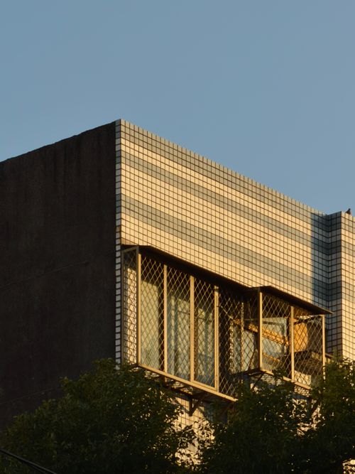 Free Sun-drenched residential building corner in New Taipei City, Taiwan, showcasing urban architecture. Stock Photo