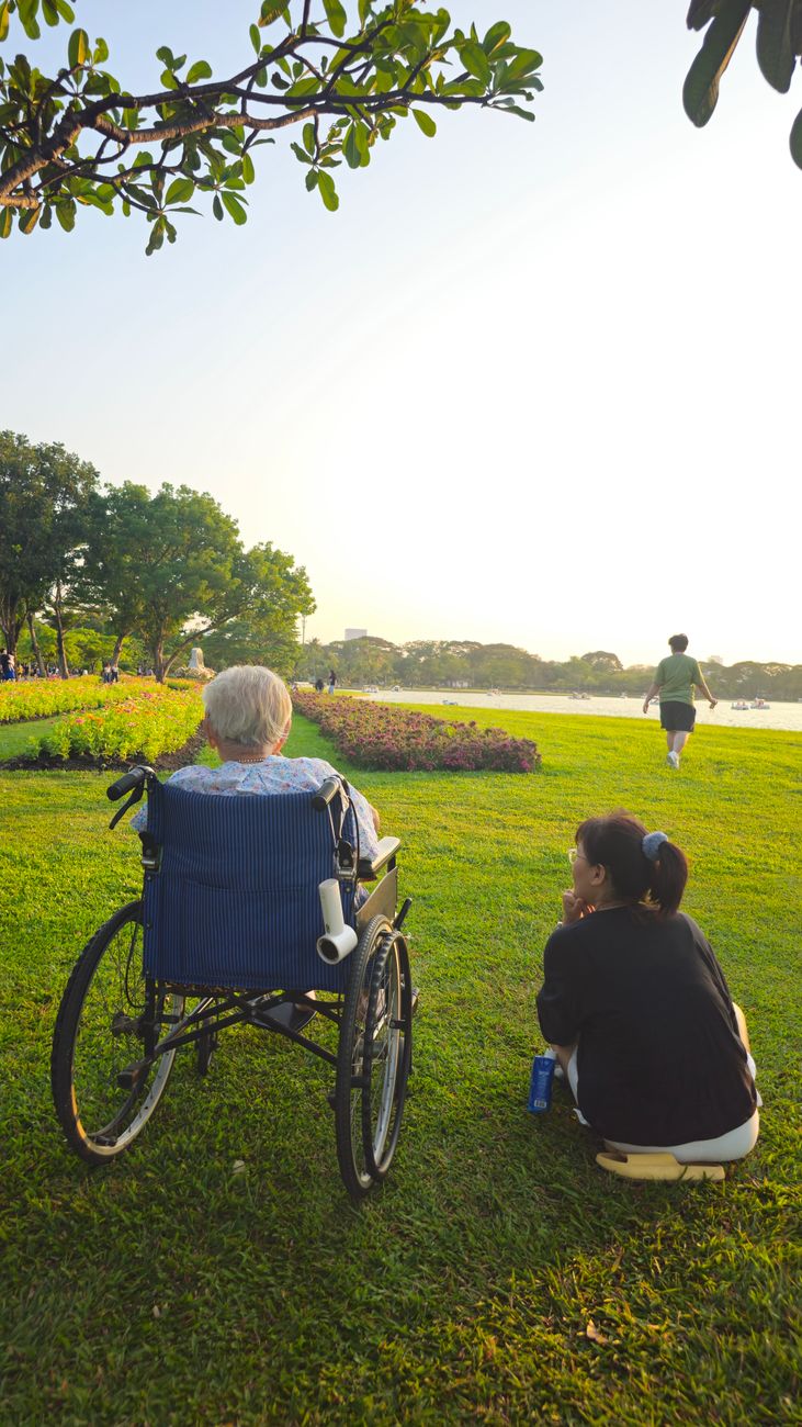 Participant and companion enjoying coffee at a South Australian community park