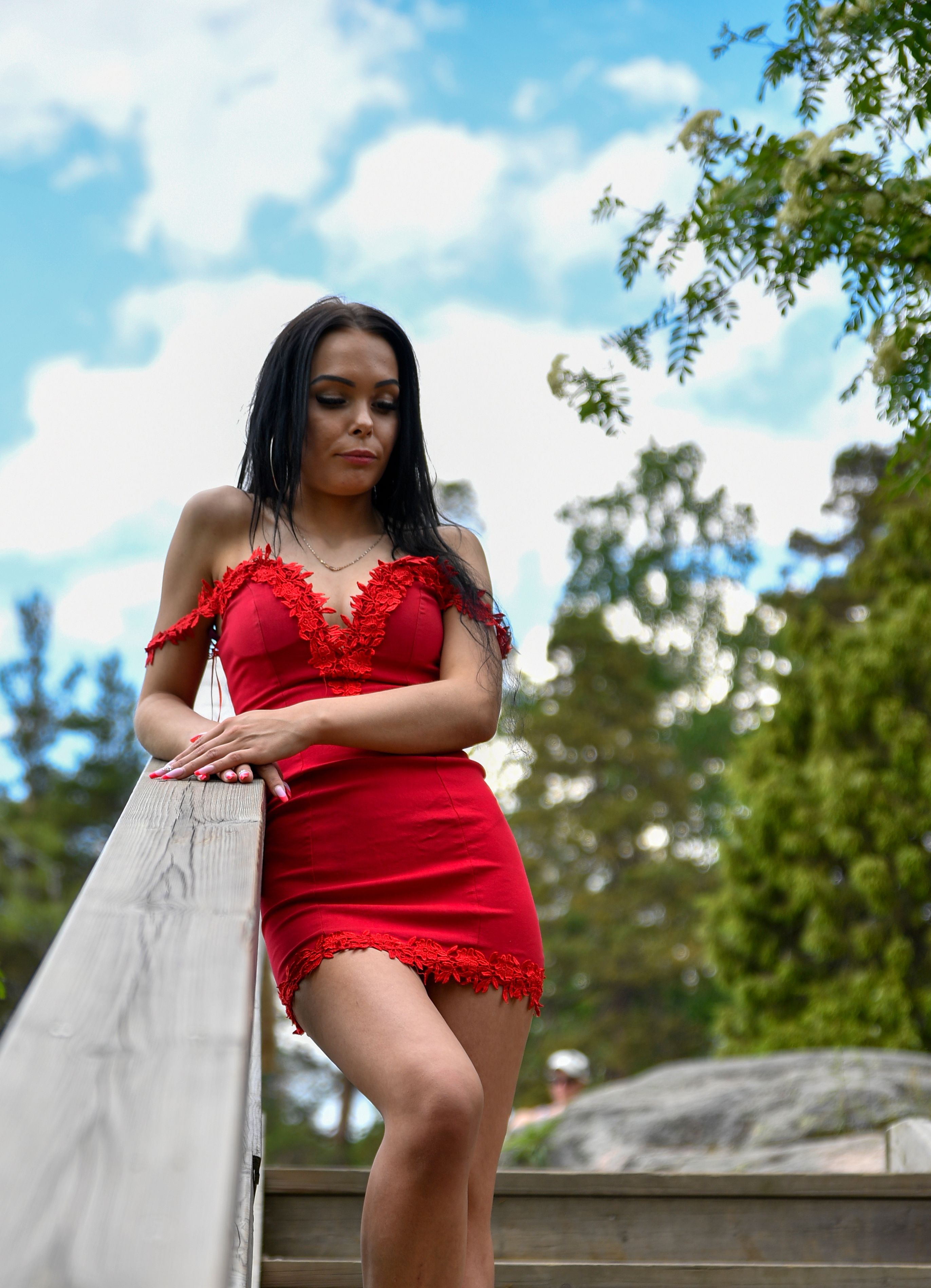 Elegant Portrait of Woman in Red Dress Outdoors · Free Stock Photo