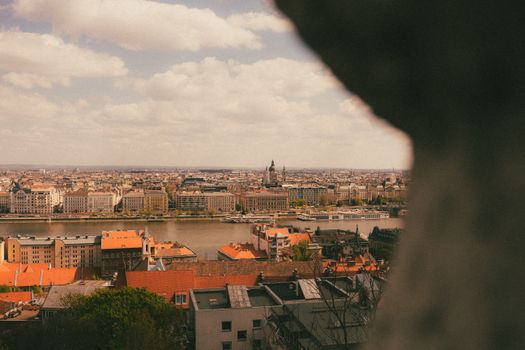 A beautiful aerial view of Budapest featuring the Danube River and historic architecture.