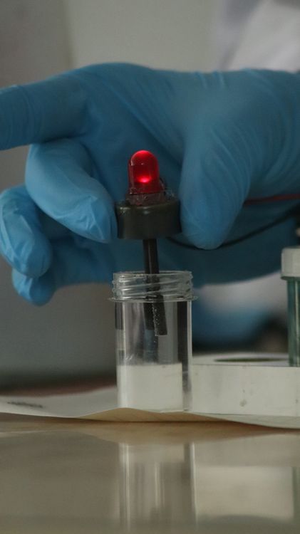 Close-Up of Scientific Experiment with Red LED Indicator · Free Stock Photo