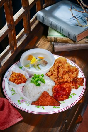 Rice plate with fried chicken and sambal, photo by Tamba Budiarsana on Pexels