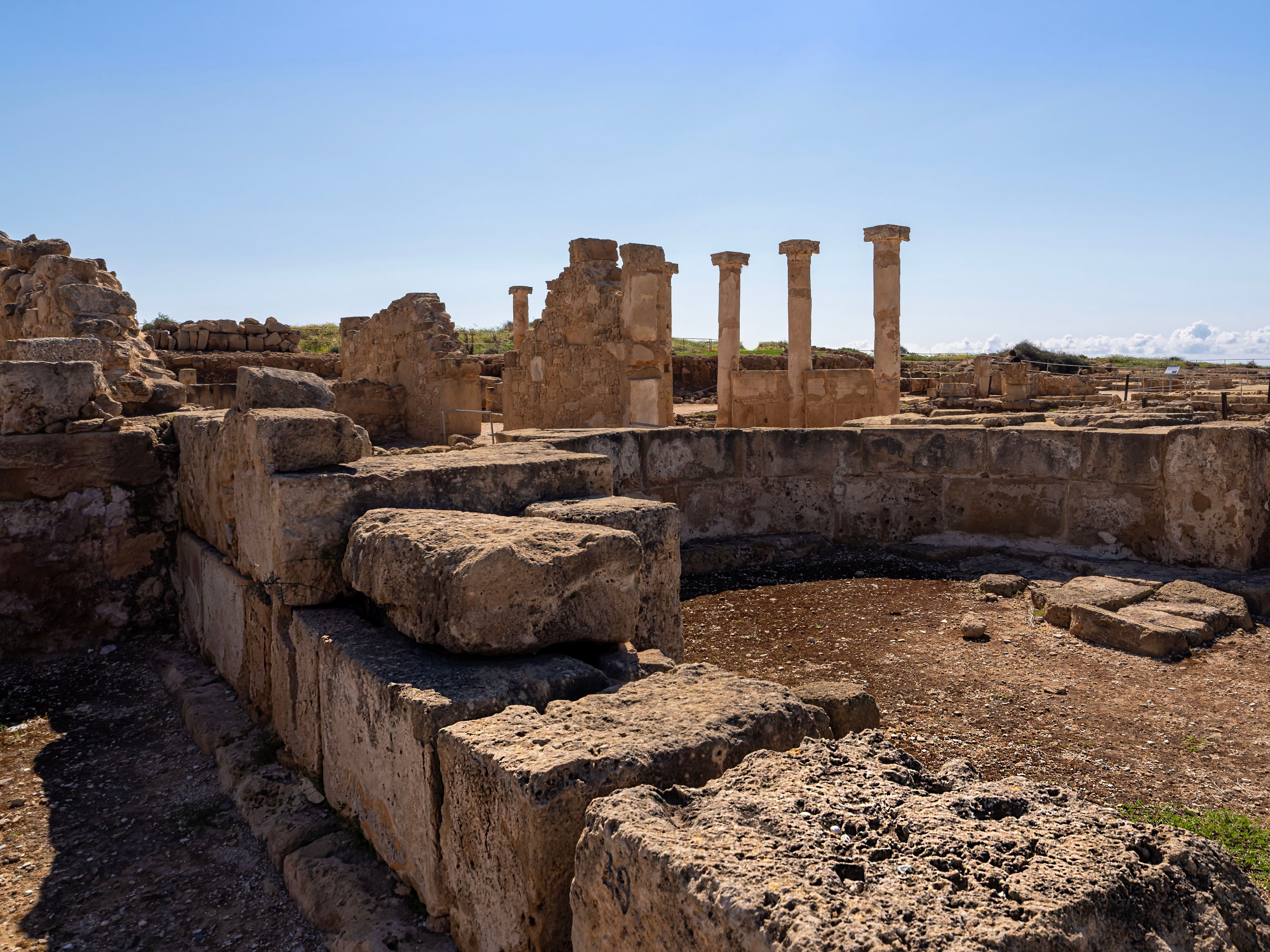 Tourists exploring the ancient Kourion archaeological site in Cyprus
