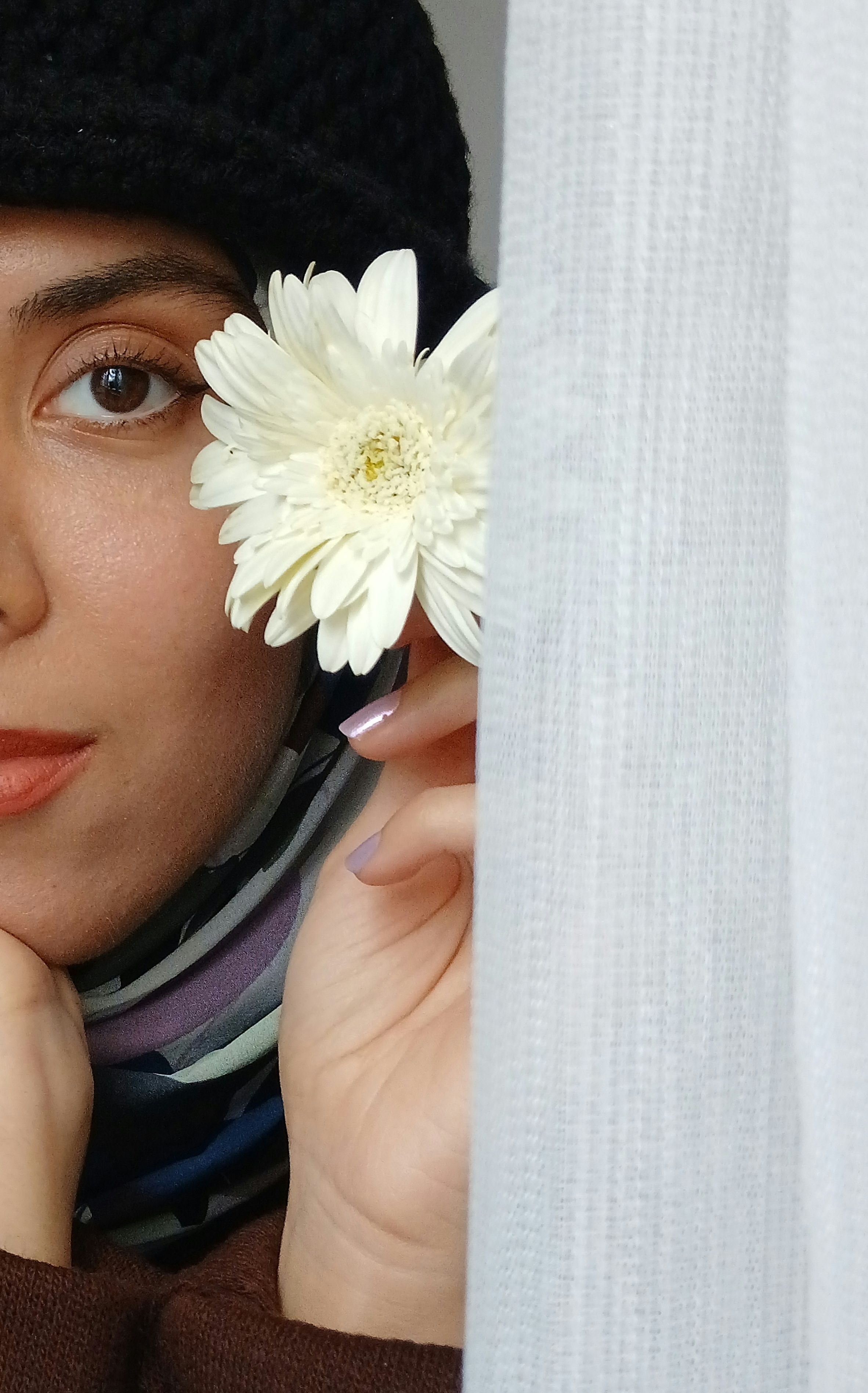 Close-up Portrait with White Flower and Scarf