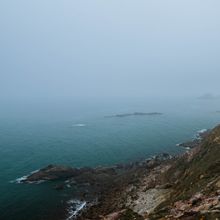 Foggy coastline — photo by 阿了个 哲 on Pexels