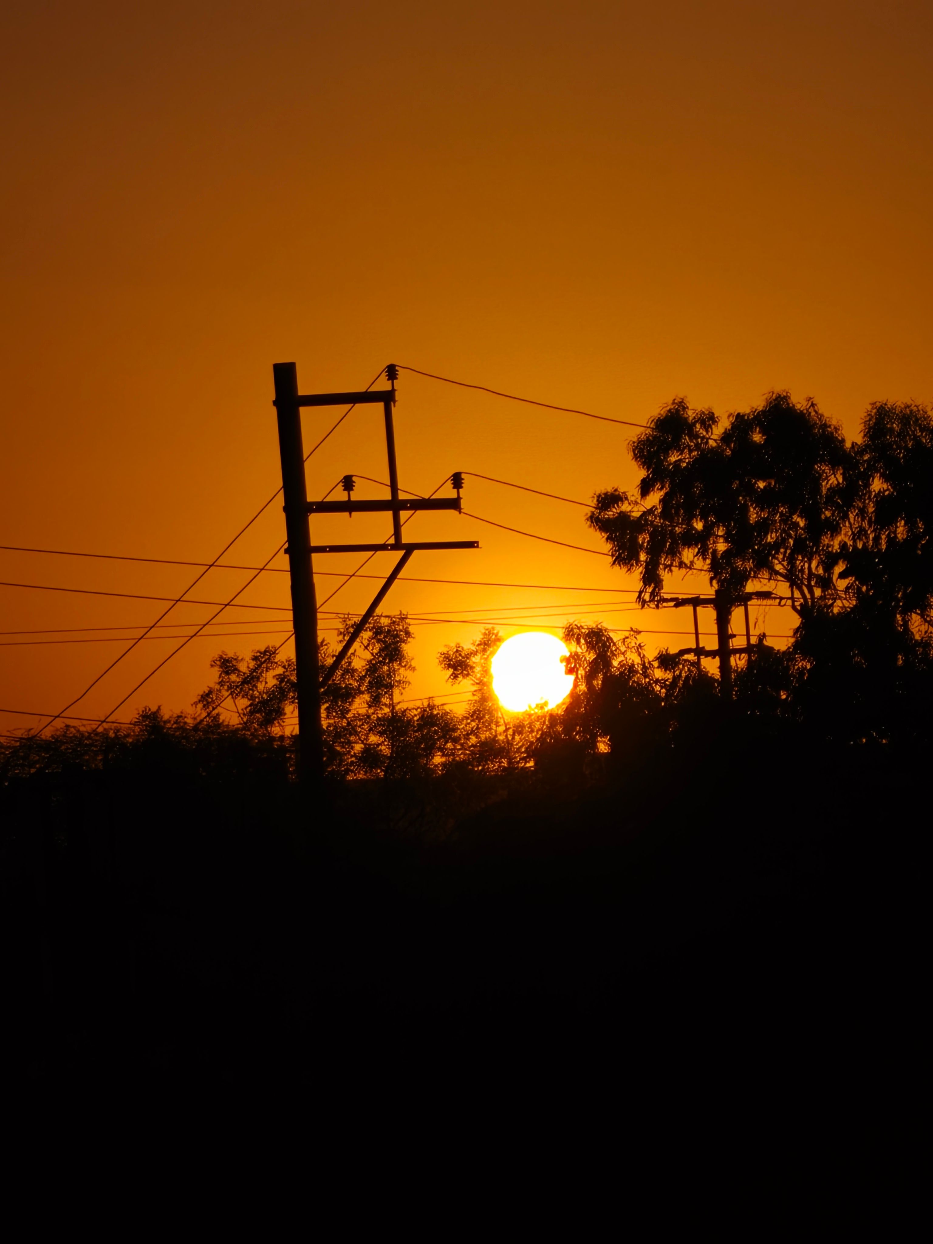 Silhouette of Power Lines at Sunset · Free Stock Photo