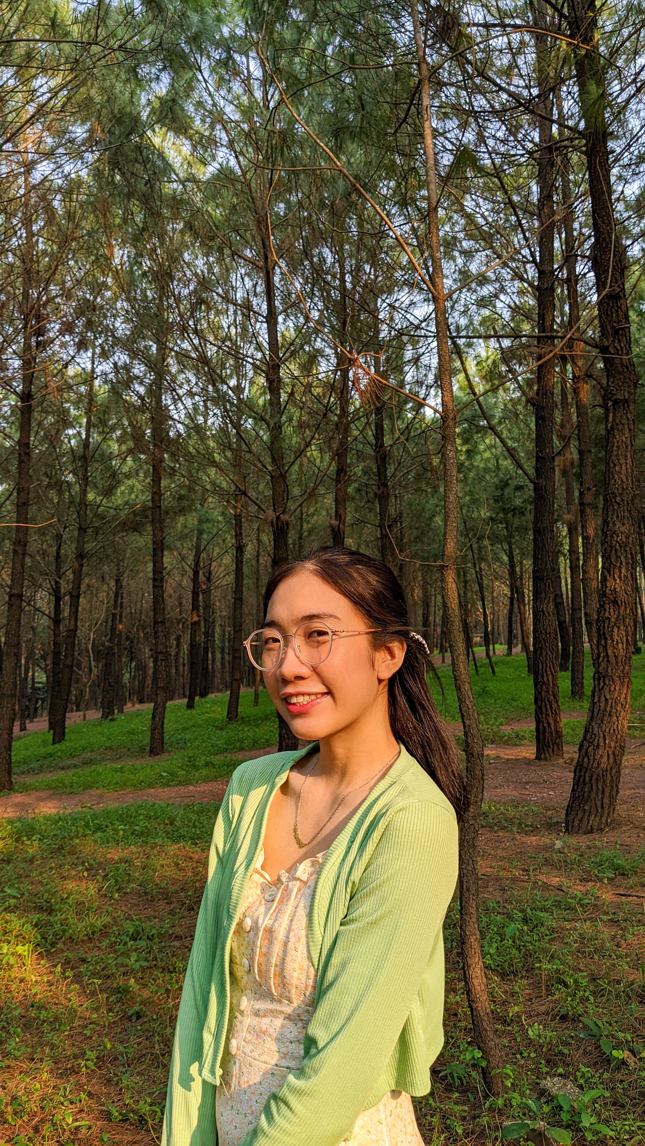 Young Woman in Sunlit Vietnamese Forest