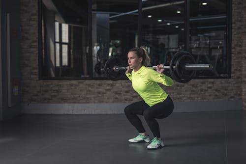 Vrouw Barbell Opheffen