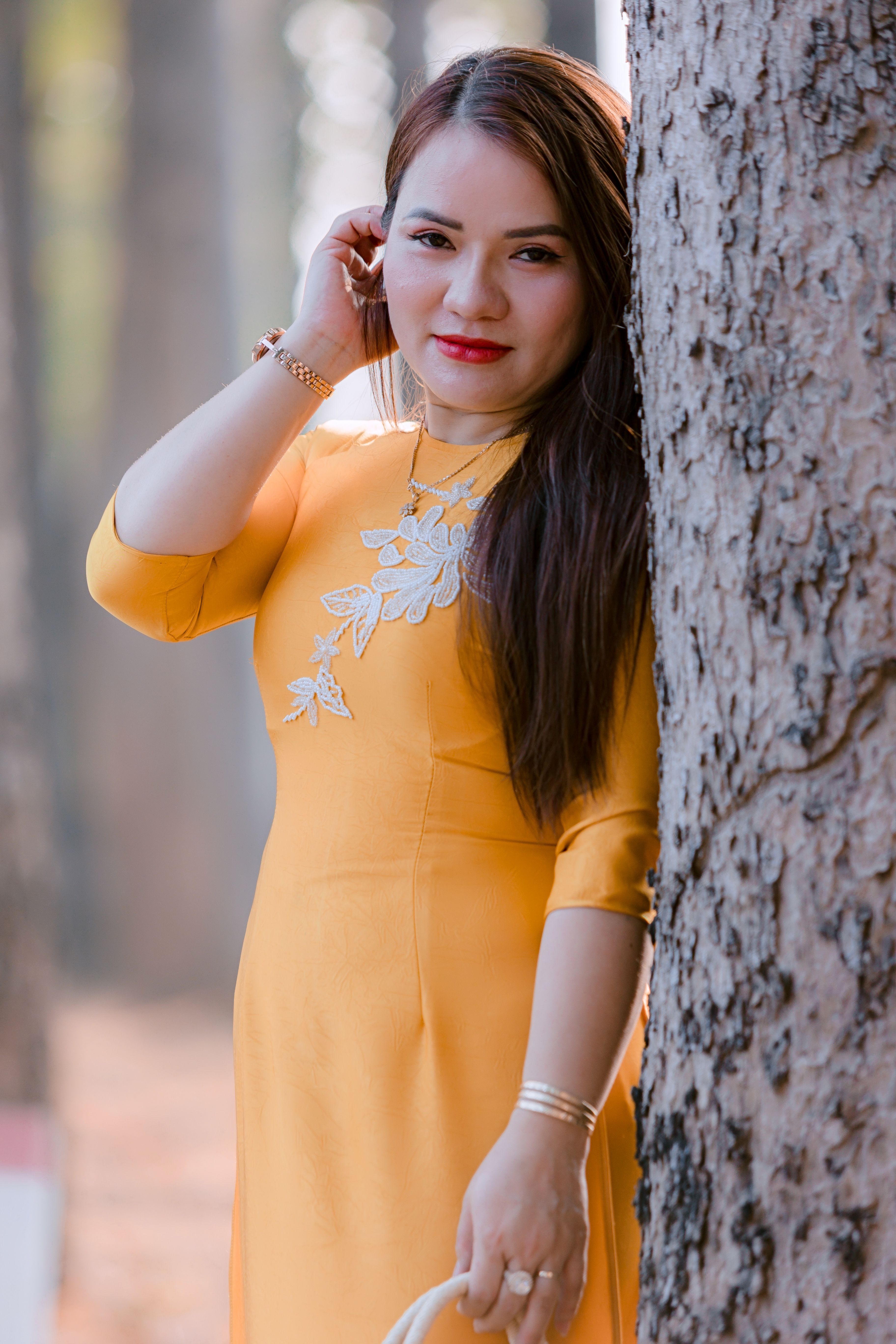 Woman in Yellow Dress by Tree in Forest Portrait · Free Stock Photo