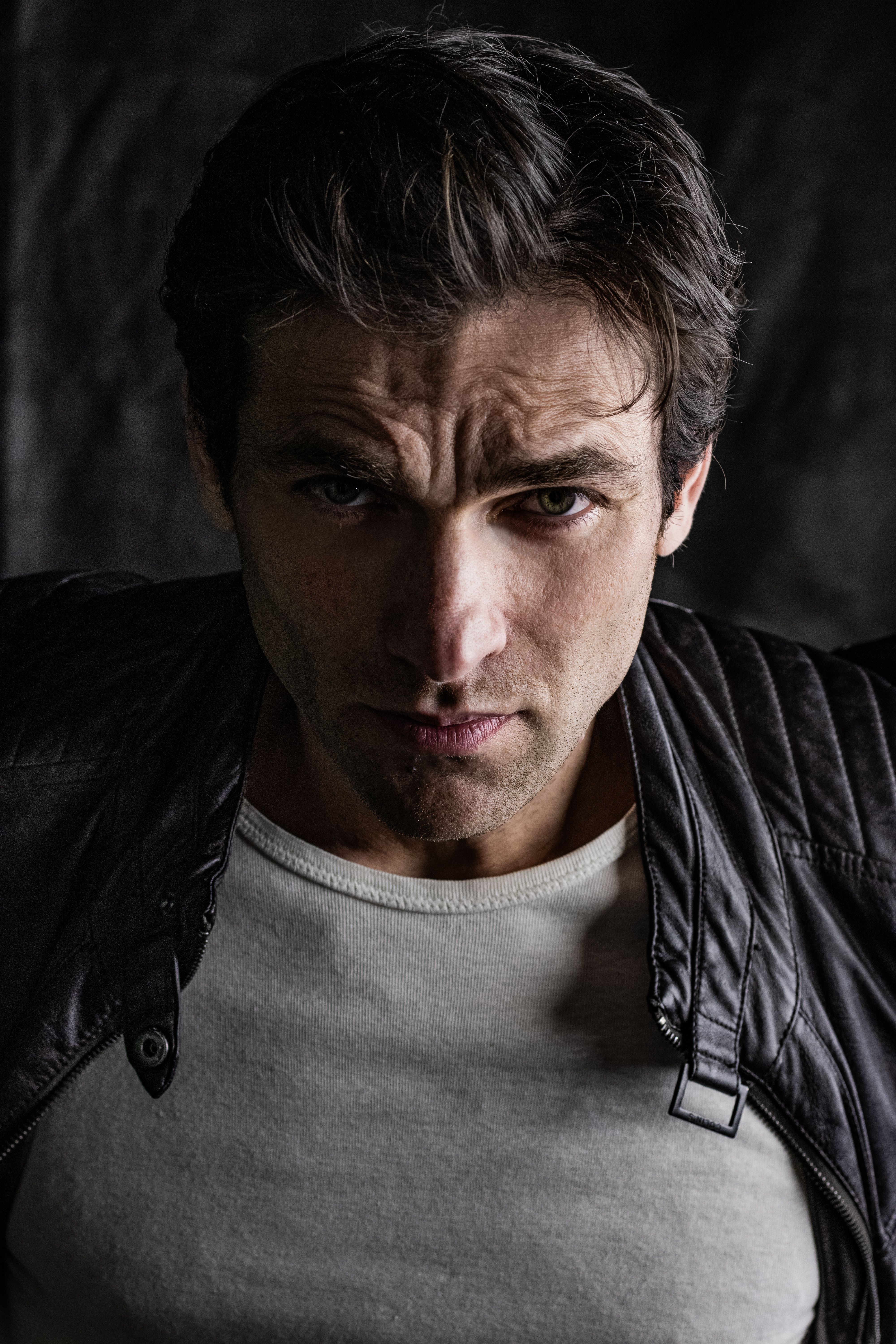 Intense Portrait of a Man in Dramatic Lighting