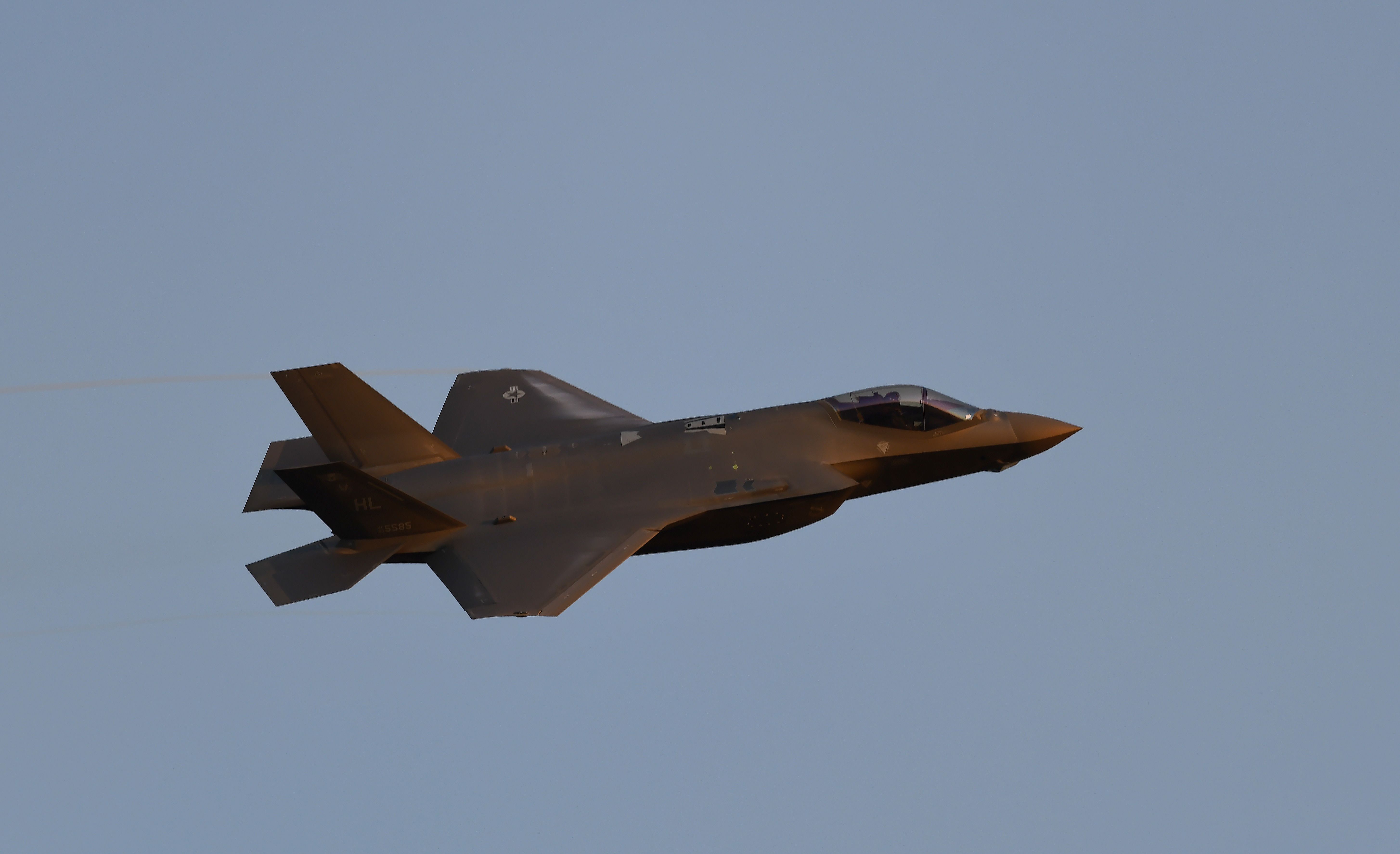 High-speed Jet Fighter in Clear Sky · Free Stock Photo
