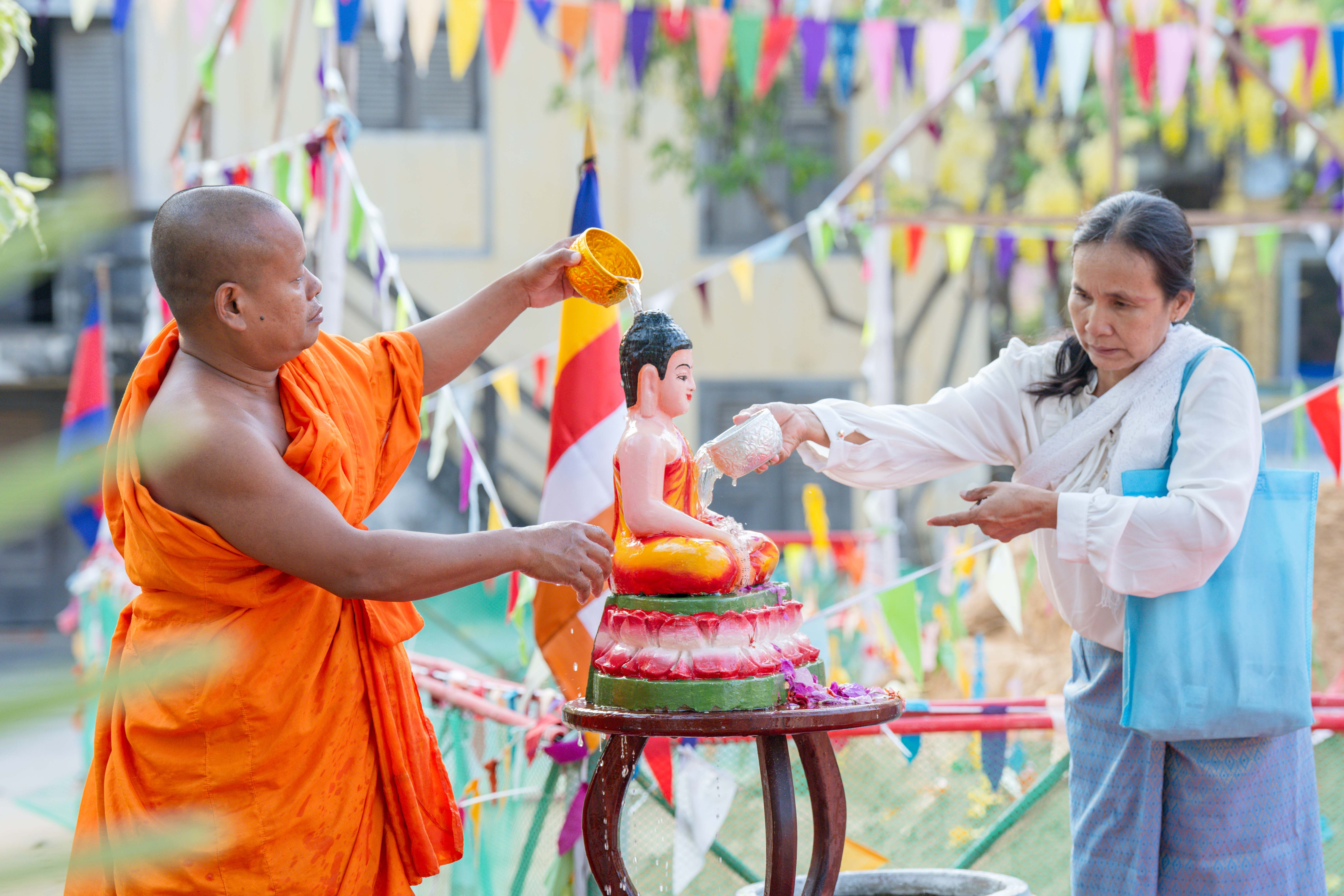 Buddhist Water Blessing Ritual in Cambodia · Free Stock Photo