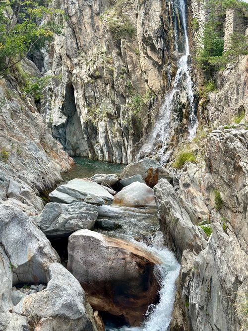 Free Discover the natural beauty of a waterfall cascading through rocky cliffs in Provence, France. Stock Photo