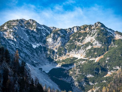 Free Stunning view of a snow-dusted alpine mountain in Hallstatt, Austria, during daytime. Stock Photo